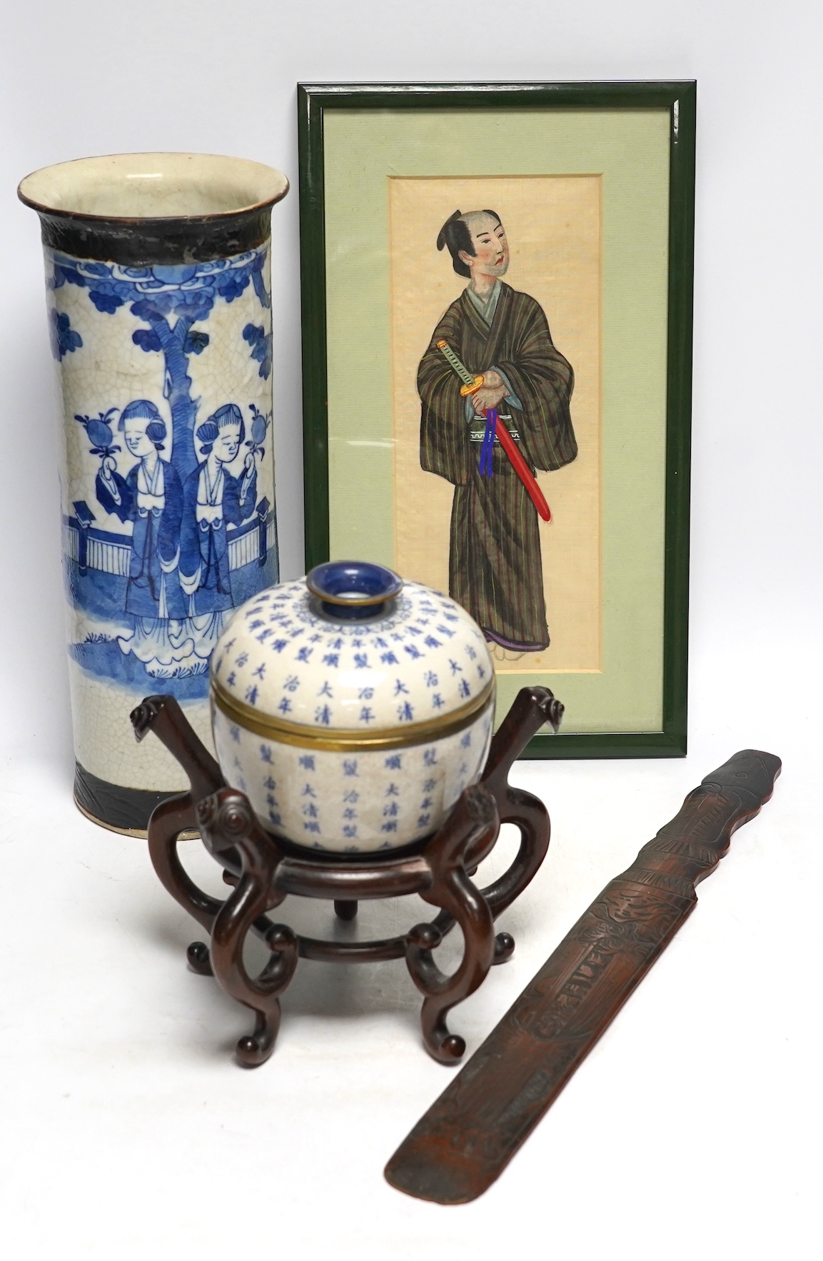 Oriental items to include a cylindrical blue and white vase with associated hardwood stand, a Japanese watercolour painting on silk together with a Japanese bamboo page turner